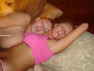 Gorgeous redhead teen with shaved pussy masturbates